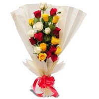 Send Mix Roses Bouquet in Crepe Wrap 12 Flowers to India