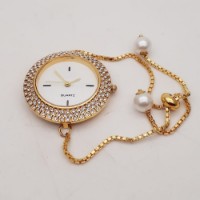 Online delivery of Ladies Fancy Watch to gift for Sister to India