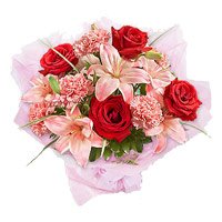 Buy Rakhi with Pink Lily, Red Rose, Pink Carnation Flowers Bouquet to India