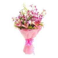 Send Rakhi with Pink Lily Purple Orchid Flowers in India Online