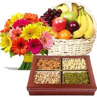 Rakhi Gift hamper for Brother Gerberas, Fresh Fruits and Dry Fruits with Rakhi