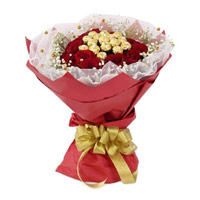 16 Pcs Ferrero Rocher Chocolate encircled with 20 Red Roses for Bhai Dooj