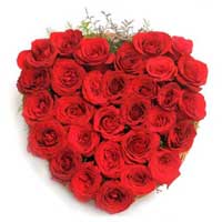 Send online New Year Red Roses Heart Arrangement 36 Flowers to India