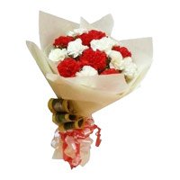 Send Rakhi Gifts Red and White Carnation Bouquet 12 Flowers with Rakhi to India